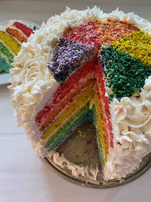 Rainbow cake with vanilla buttercream and hemp hearts